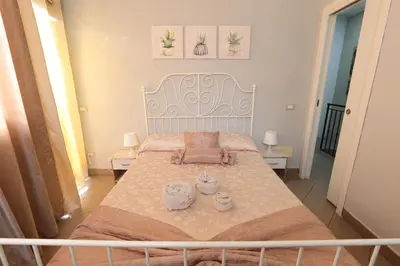 Letto o letti in una camera di U Casteddu Home Motta Sant'Anastasia 1