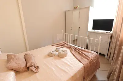 Letto o letti in una camera di U Casteddu Home Motta Sant'Anastasia 1