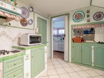 Cucina o angolo cottura di Holiday Home Zyklopenhaus- Erstaunliche Aussicht und privates Mini-Spa by Interhome