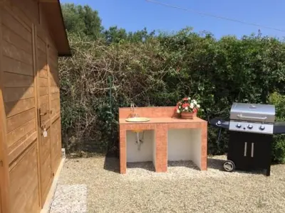 Attrezzature per barbecue disponibili per gli ospiti della casa vacanze