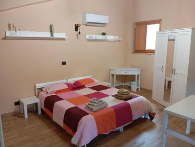 Letto o letti in una camera di Loft Mansardato