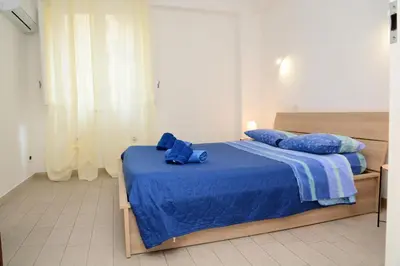 Letto o letti in una camera di Dimora dell'Etna e del mare