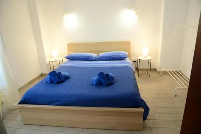 Letto o letti in una camera di Dimora dell'Etna e del mare