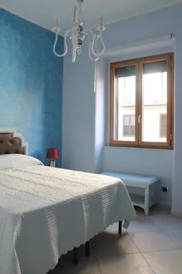 Letto o letti in una camera di Cavour Rooms