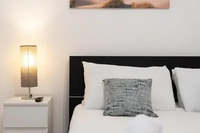 Letto o letti in una camera di Niùra House