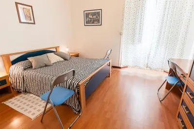 Letto o letti in una camera di Al Villino Sunshine appartamento in villa con piscina