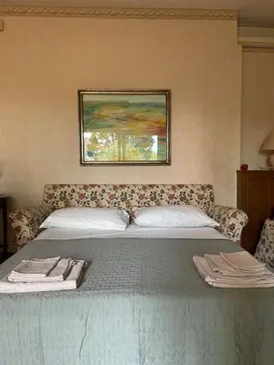 Letto o letti in una camera di Lognina