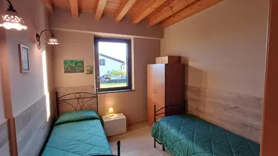 Letto o letti in una camera di Profumo di Zagara Acireale