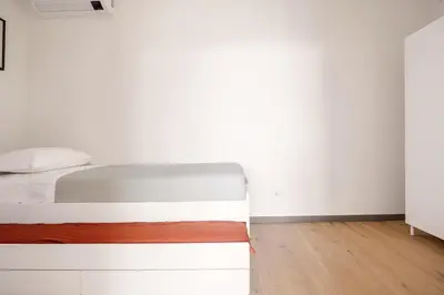 Letto o letti in una camera di Rotolo Roof 21 5C