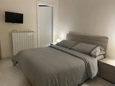 Letto o letti in una camera di Casa Fabrizio