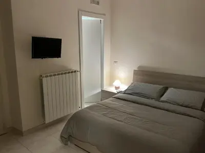 Letto o letti in una camera di Casa Fabrizio