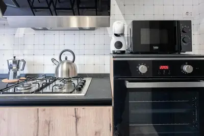 Cucina o angolo cottura di Luminoso Appartamento Vista Mare sul Lungomare