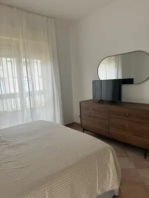 Letto o letti in una camera di Casa Galatea