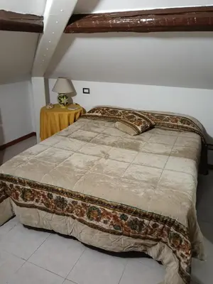 Letto o letti in una camera di Teseo by the sea
