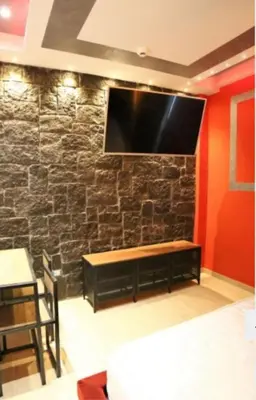 TV o dispositivi per l'intrattenimento presso Wellhomeluxury
