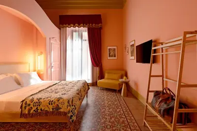 Letto o letti in una camera di Le Stanze di Monserrato