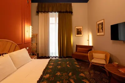 Letto o letti in una camera di Le Stanze di Monserrato