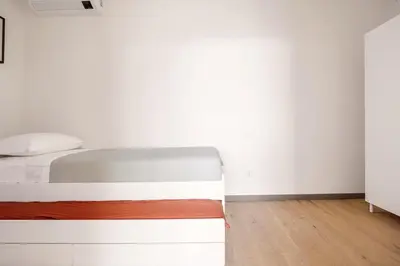 Letto o letti in una camera di Top-Floor Sea View with Pool Access