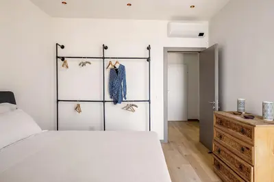 Letto o letti in una camera di Top-Floor Sea View with Pool Access