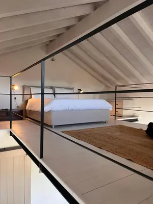 Letto o letti in una camera di La Casetta Greco Mirone