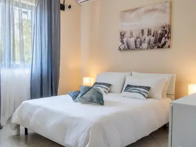 Letto o letti in una camera di Apartment Zafferana's Pool Rückzugsort by Interhome