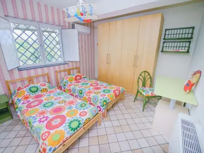 Letto o letti in una camera di Apartment Villa delle Pomelie by Interhome