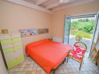 Letto o letti in una camera di Apartment Villa delle Pomelie by Interhome