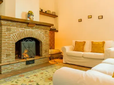 Area soggiorno di Holiday Home Gemütliche Dimora Cariga in Giarre by Interhome
