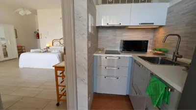 Cucina o angolo cottura di Faraglioni Sea Terrace