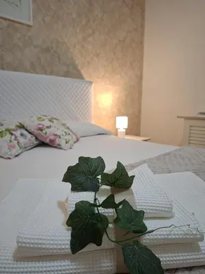 Letto o letti in una camera di Sciara casa vacanze