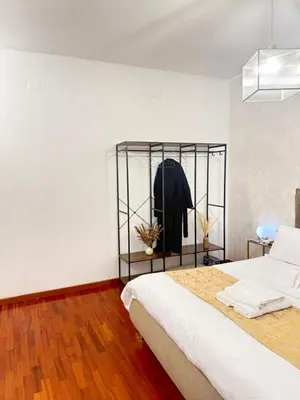 Letto o letti in una camera di Etna Suite by Dama - Central Catania