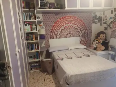 Letto o letti in una camera di Elettra