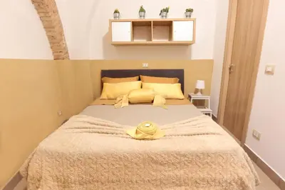 Letto o letti in una camera di U Casteddu Home Motta Sant'Anastasia 2