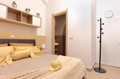 Letto o letti in una camera di U Casteddu Home Motta Sant'Anastasia 2