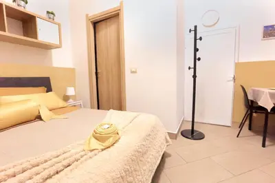 Letto o letti in una camera di U Casteddu Home Motta Sant'Anastasia 2