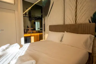 Letto o letti in una camera di Agorà Luxury Experience
