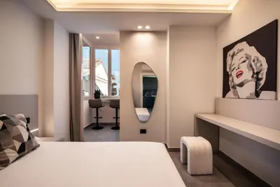 Letto o letti in una camera di Sapore di sale