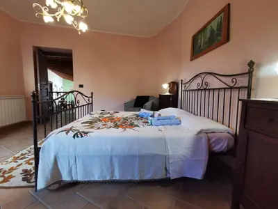 Letto o letti in una camera di Casa La Dimora