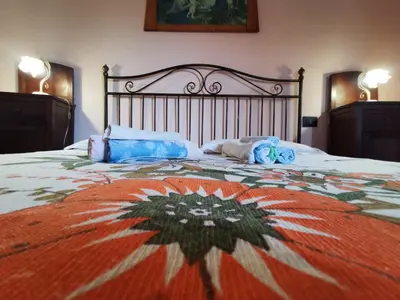 Letto o letti in una camera di Casa La Dimora