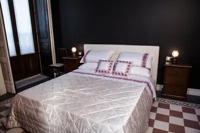 Letto o letti in una camera di Art Fashion House Luxury Rooms