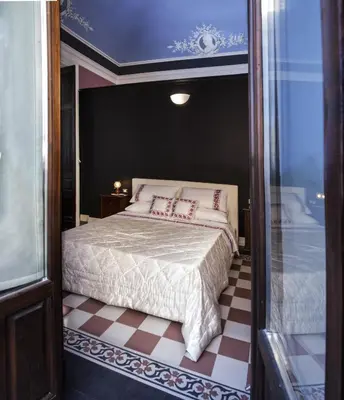 Letto o letti in una camera di Art Fashion House Luxury Rooms