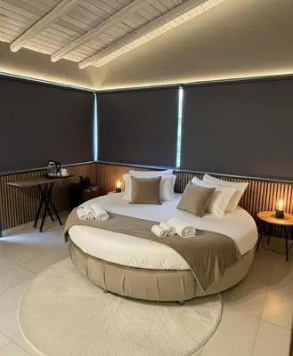 Letto o letti in una camera di Michelangelo Etna Hotel