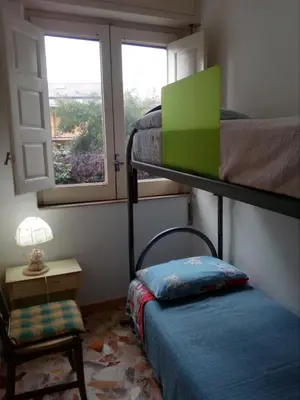 Letto o letti in una camera di Casa Macchia