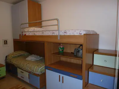 Letto o letti in una camera di Casa Scalo Grande