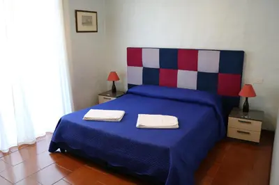 Letto o letti in una camera di L'elefante