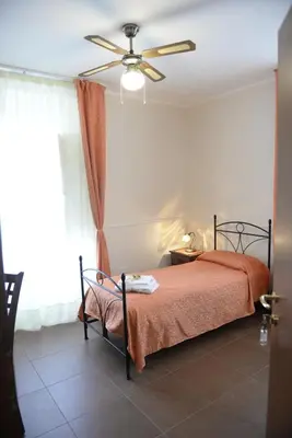 Letto o letti in una camera di B&B San Leonardo