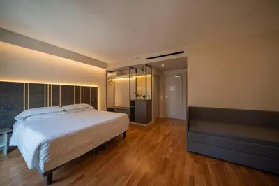 Letto o letti in una camera di Plaza Hotel Catania