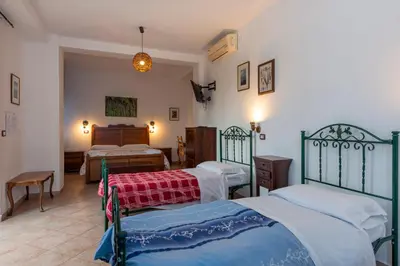 Letto o letti in una camera di Agriturismo dell'Etna