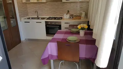 Cucina o angolo cottura di Appartamenti Sole delle Aci