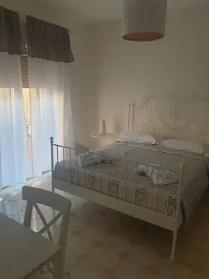 Letto o letti in una camera di Dimoramuri B&B